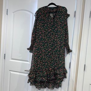 Runs very generous light easy breezy dress perfect with belt
